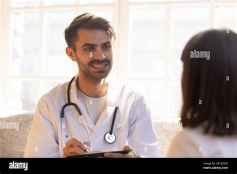 Positive Male Doctor Visit Little Patient At Home Stock Photo Alamy