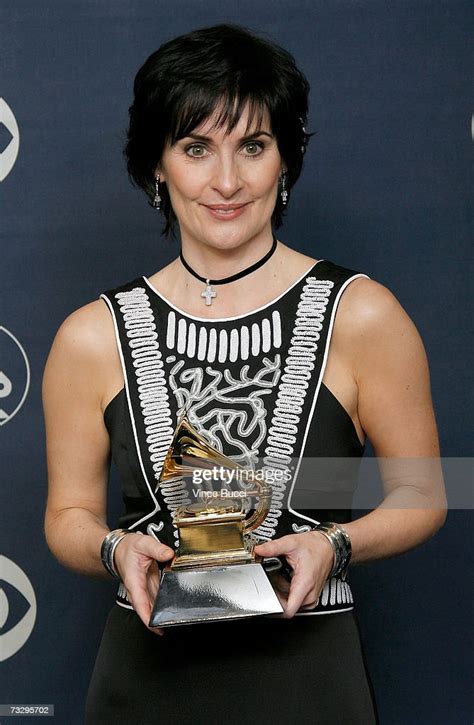 Singer Enya Poses In The Press Room With Her Grammy For Best New Age