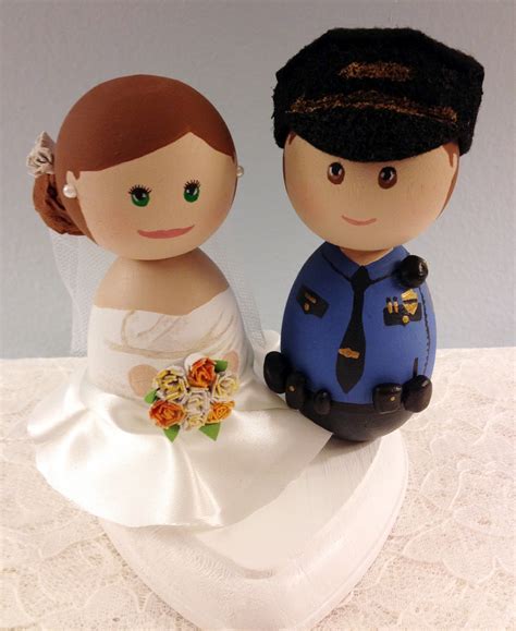 See and discover other items: DSMeeBee: Bride and Police Officer Wedding Cake Toppers