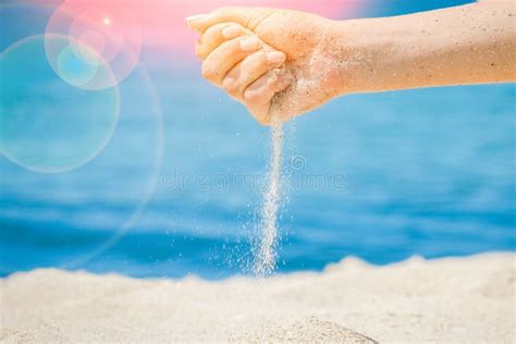 Hands Are Pouring Sand By The Sea Stock Photo Image Of Finger Time