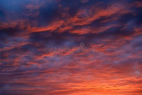 Abstract Watercolor Sunset Cloudy Sky From Orange To Purple Stock Photo