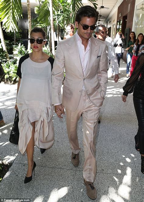 Kim Kardashian Yelps As Sister Kourtney Squirts Fresh Off The Boob Breast Milk Onto Her Leg In