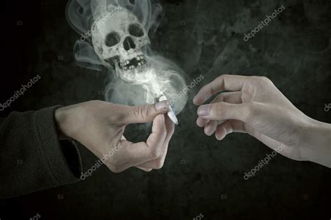 Two Smokers Sharing Cigarette — Stock Photo © Realinemedia 62493875