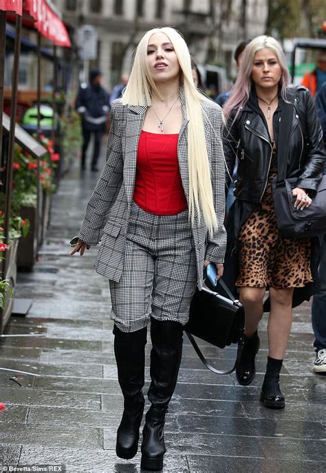 Ava Max Wows In A Checked Monochrome Suit A Red Corset Top And Knee
