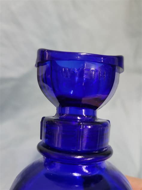 Vintage Wyeth Collyrium Eye Lotion Bottle With Eye Wash Cup Lid Cobalt Blue Ebay