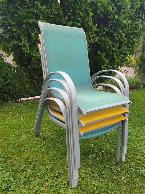 Suchst du zu deinem gartentisch auch die passenden gartenstühle? 4 Stapelstühle /Gartenstühle gelb/türkis | Kaufen auf Ricardo