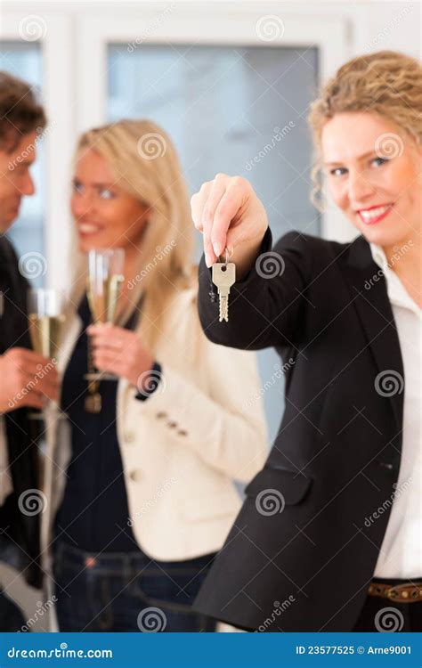 Young Couple Looking For Real Estate With Realtor Stock Image Image Of Couple Empty 23577525