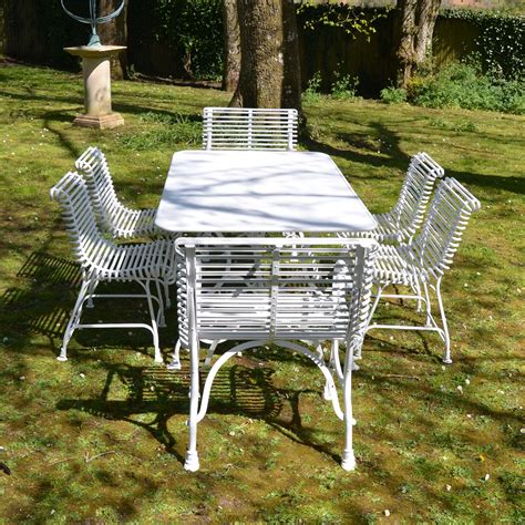 Crafted from a wide selection of materials and fabrication techniques, offering shapes and sizes the choice is endless. The Small Rectangular Garden Dining Table for Six with ...