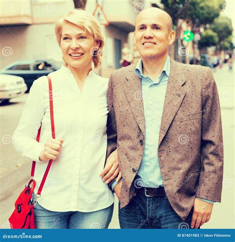 Retiree Couple Walking Stock Image Image Of Positive 87401983