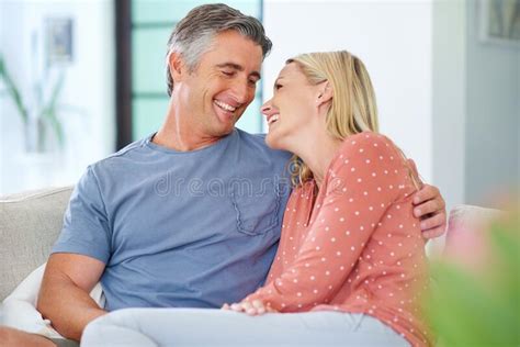 You Complete Mea Mature Couple Being Affectionate At Home Stock