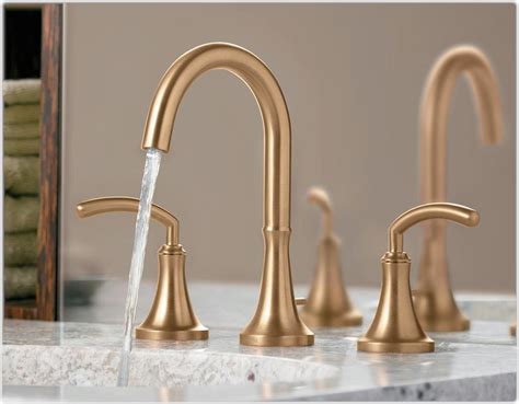 Detailed designs are conspicuous from the escutcheon and lever handle. Antique Brass Bathroom Faucet Moen