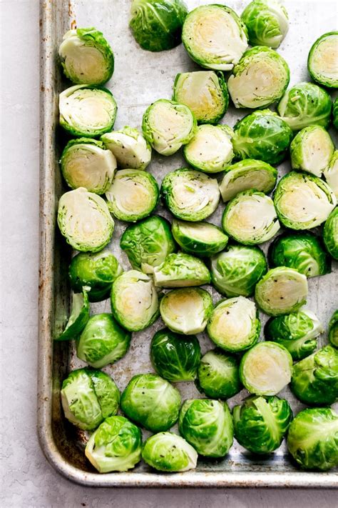 Trim and halve brussel sprouts and transfer to a large mixing bowl. The Best Garlic Butter Brussels Sprouts | Little Spice Jar