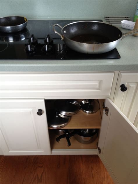 There are very few drawers or cabinets that can store a large appliance like your mixer.plus, the size and weight may even damage your cabinets. Put pan cabinet right underneath stove top for easy access ...