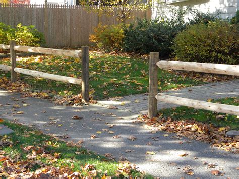 Position a garden hose, starting at a corner or end of a split rail fence. Cedar split rail fencing used in a residential setting | Fence landscaping, Front yard ...