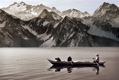 Canoeing In The Shadow Of The Mountains Image Free Stock Photo