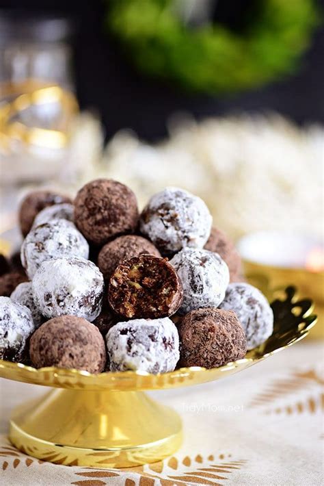 Rum or bourbon balls made with crushed vanilla wafers, powdered sugar, cocoa, ground nuts and bourbon or rum. Easy Holiday Rum Balls Recipe | TidyMom®