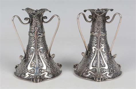 A Pair Of Art Nouveau Silver Posy Vases Each Of Tapered Cylindrical Form With A Triform Rim Above S