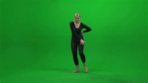 woman dancing against green screen — stock video © stockmedia 69424533