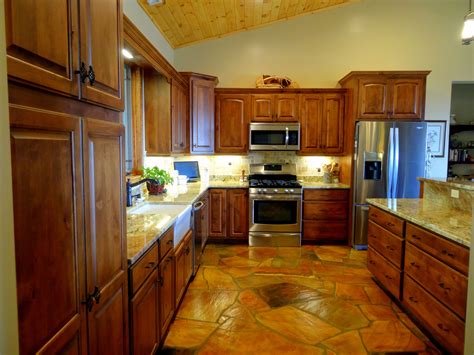 How to design wooden corner cabinet : Rustic Kitchen by High Country Cabinets of Banner Elk, NC. Features rustic alder cabinetry ...