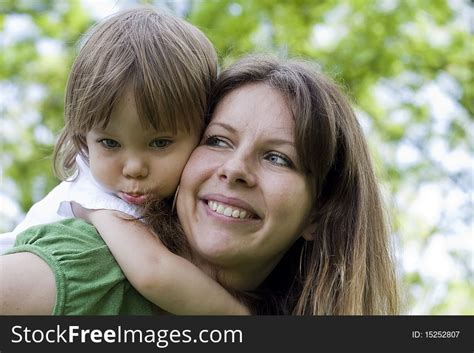 Mother Holding Daughter Outdoors Smiling Free Stock Images Photos