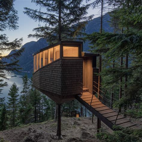 Helen And Hard Hangs Woodnest Treehouses From Pine Trees Above Norwegian