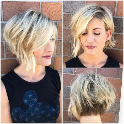 inverted blonde textured bob with side swept bangs and shadow roots blonde balayage bob short