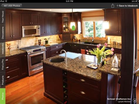 Oak and black or other dark colored granite. Dark cabinets | Kitchen cabinet design, Brown granite ...