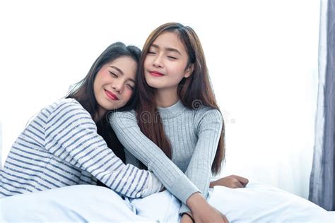 Two Asian Lesbian Hug Together In Bedroom Beauty Concept Happy Lifestyle And Home Sweet Home