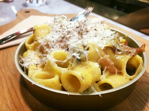 Instead of eggs benedict and pancakes, you might find buffet tables filled with pasta salads and trays of cheeses and cured meats. Where to go for the Best Brunch in Rome - The Travel Hack