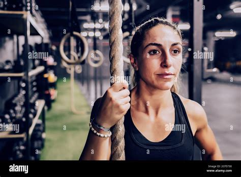 Muscular Woman With Rope And Looking Way On Gym Stock Photo Alamy