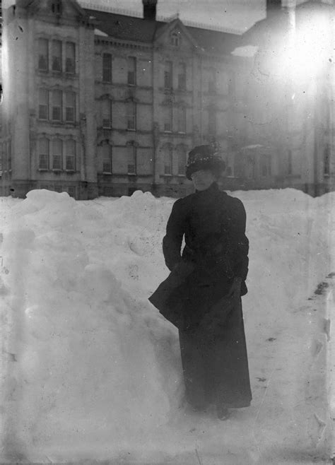 An Unknown Woman Outside A Traverse City State Hospital Building In