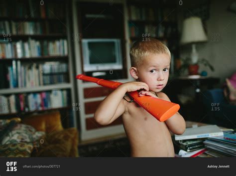 Boy Playing With A Toy Gun Stock Photo Offset