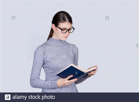 Puzzled Student Girl Reader Looking Sad In A Book Confused Student