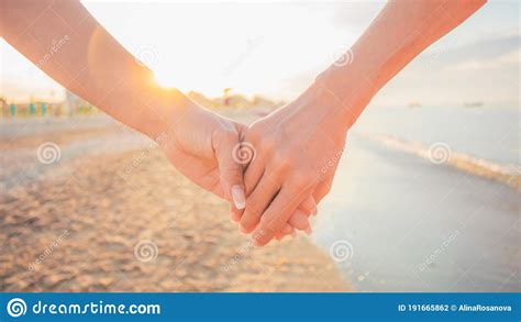 Two Girls Walking On The Beach Hand By Hand Stock Photo Image Of