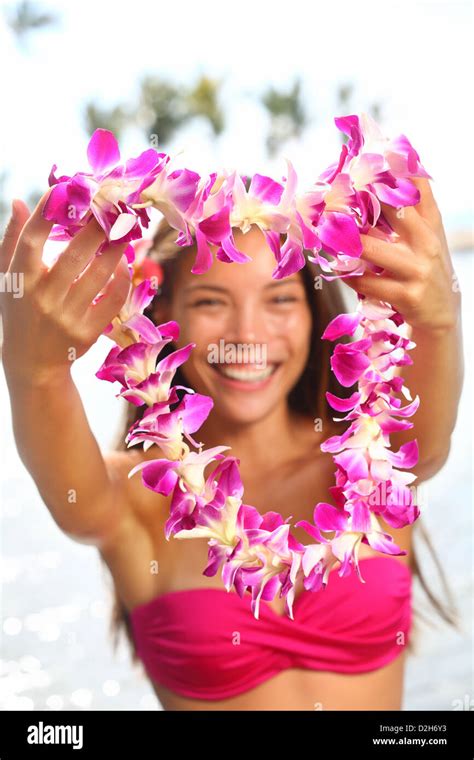 Beautiful Smiling Mixed Race Woman In Bikini On Beach Giving A