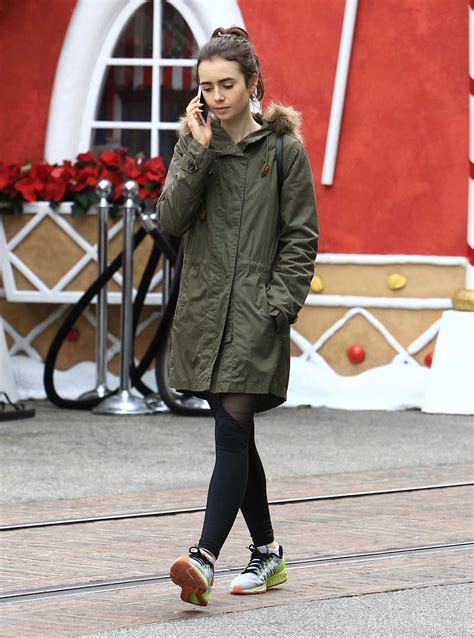 Lily Collins Does Some Christmas Shopping At The Grove In Los Angeles