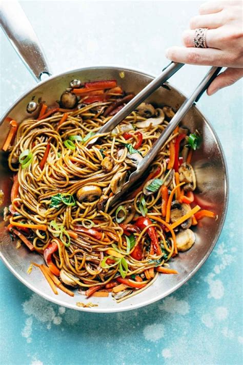 This easy beef stir fry with noodles can be made in just 20 minutes! ramen-noodles-with-vegetables-good-home-cooked-meals-stirred-with-tongs-in-metal-pan in 2020 ...