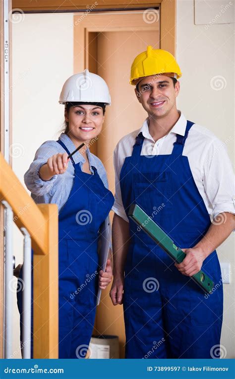 Professional Maintenance Crew Of Two Specialists Indoors Stock Image