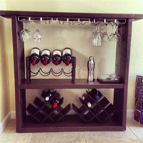 This is a minimalist pallet wine rack with a dark stain. DIY wine bar 2x12 lumber cut to size & painted Attached ...