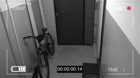 surveillance camera caught the thief broke the door and stole the bike ...