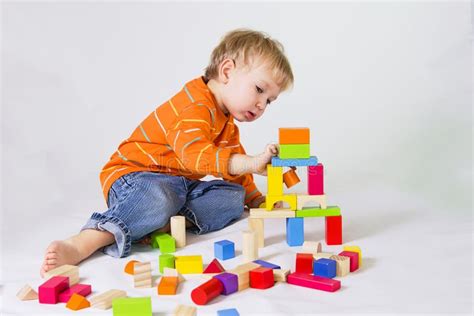Boy Playing With Wooden Blocks Stock Image Image Of Colorful