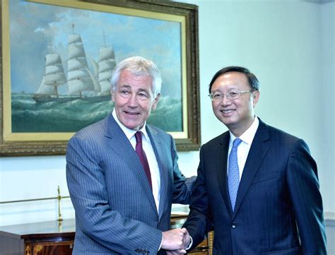 Visiting Chinese State Councilor Yang Jiechi Shakes Hands With U S Defense Secretary Chuck Hagel