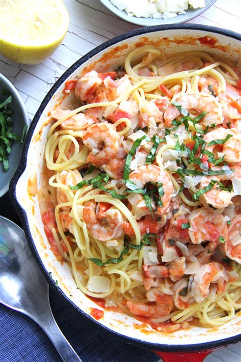 We would rather stay home, make this cozy white wine shrimp pasta and have a nice dessert along with some wine. Creamy Tomato & Basil Shrimp Pasta