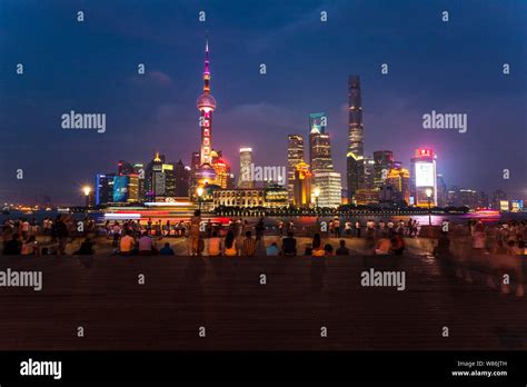 This Photo Taken From The Promenade On The Bund In Puxi Shows A Night
