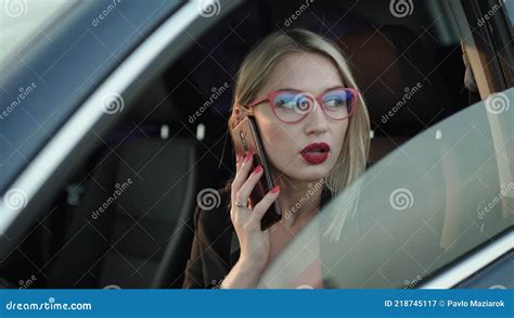 The Blonde In Glasses Talking On The Phone In Car S Front Seat Stock Video Video Of Highway