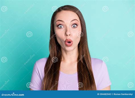 Photo Portrait Of Amazed Shocked Girl Starring With Opened Mouth