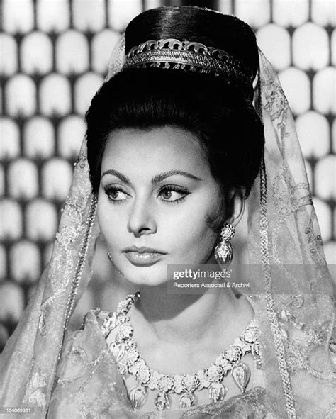 The Italian Actress Sophia Loren With A Hair Bun Coronet And A Veil