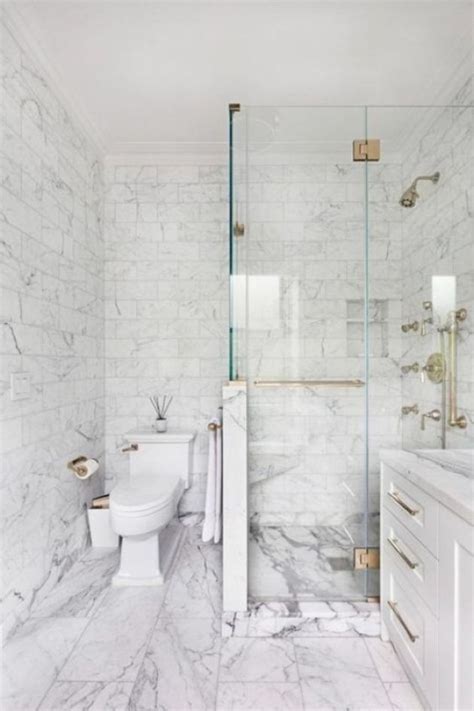 Neutral Bathroom With White Marble Tiles Of Various Sizes Bathrooms