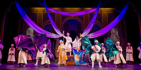 Slide the pucks towards the end of the table with out knocking them off. 5 Best Stage Shows at Sea
