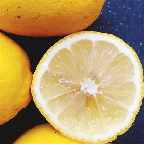 stacked whole lemons peel on citrus yellow lemons piled up sour fruit fresh vitamins lemon